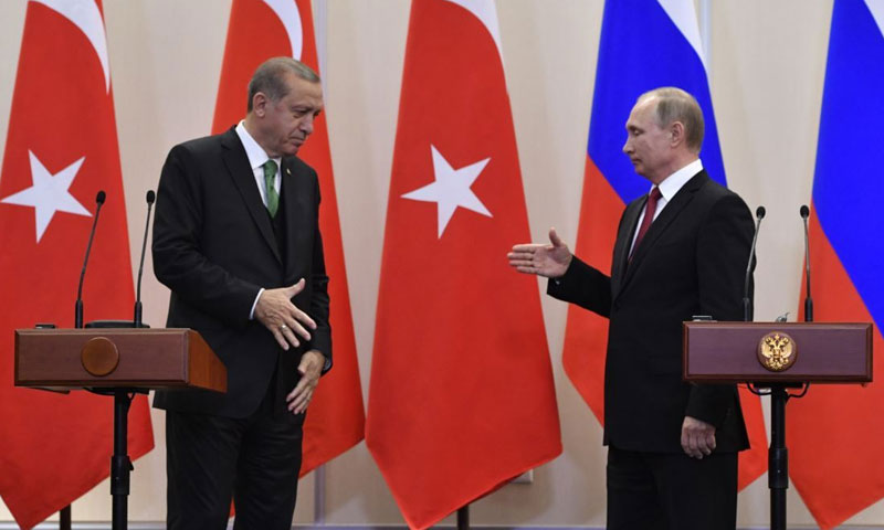 الرئيس التركي رجب طيب أردوغان والروسي فلاديمير بوتين- 23 من كانون الثاني 2019 (AP)