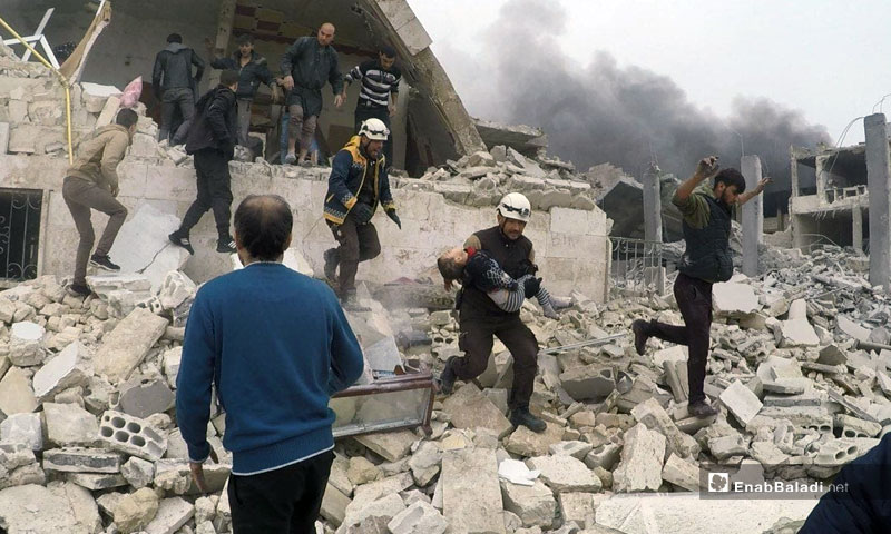 A rescue operation for a girl from the rubble after an aerial bombing that targeted her family's house - December 15, 2019 (Enab Baladi)