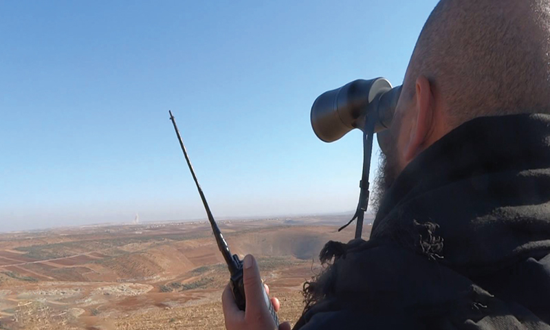 A man working as an observer to alert civilians of potential airstrikes - 2016 (SMART)