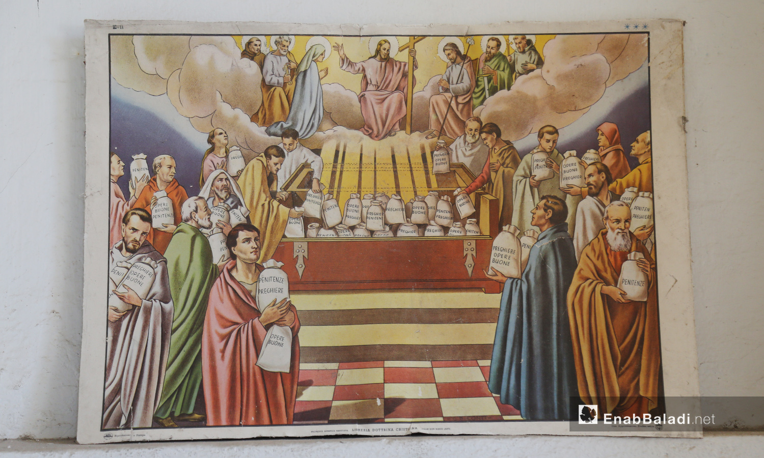 A wall painting inside “Mar Georges” Church in Jisr al-Shughur portraying Jesus Christ while distributing penance to his followers – July 2020 (Enab Baladi)