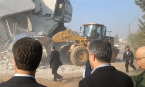 Hama governor supervising the demolition of houses in Hama